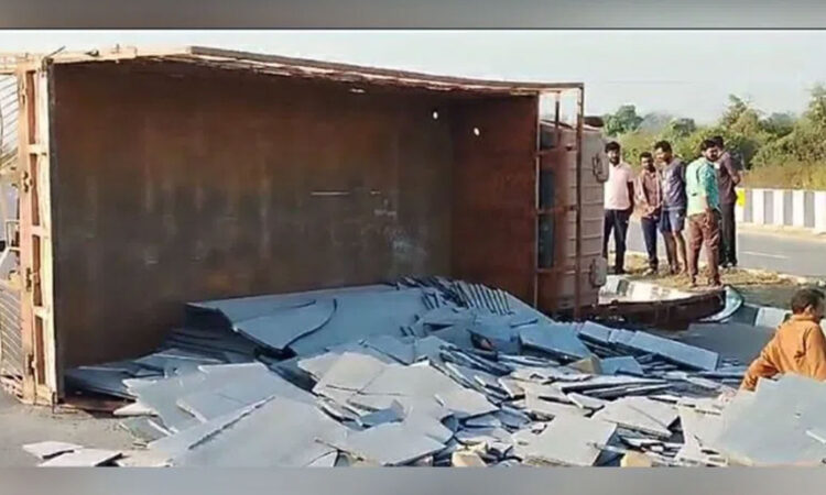 Granite-laden lorry overturns near Mudigonda on Khammam-Kodad highway, killing two and injuring eight.