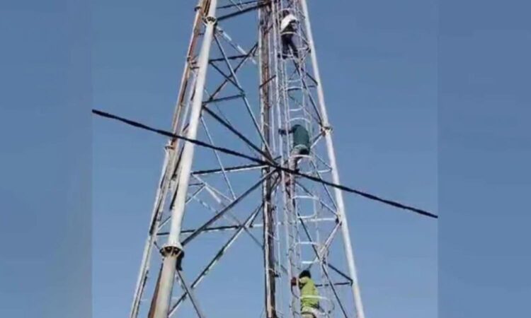 Sangareddy villagers climb cell towers to protest GHMC dumping yard, demanding relocation over health and environmental risks.